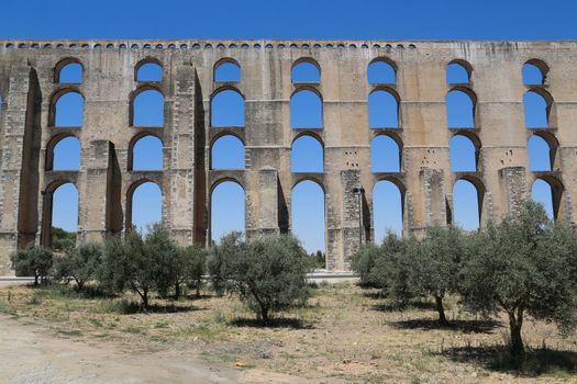 The arches of the Roman Aqueduct Aqueduto da Amoreira in Elvas in Portugal