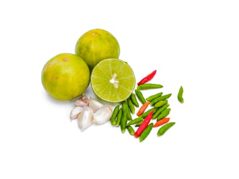 Chili peppers, garlic and lime on white background. Asian ingredients food