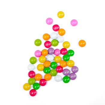 Colorful candies on white background