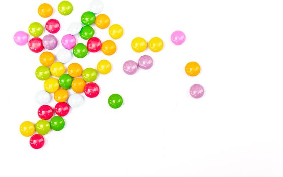 Colorful candies on white background