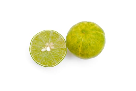 Juicy slices of lime isolated on white background.