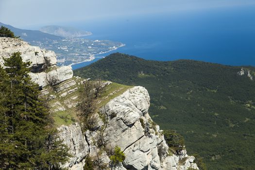 The seashore in the light of the sun from big height