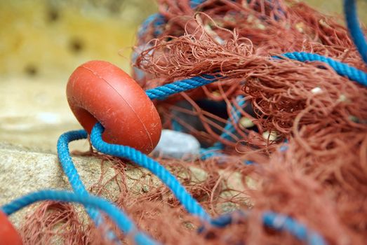 Closeup detail of a red fishing net used in Majorca