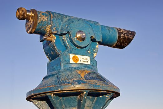 Coin operated rusty telescope in Spain