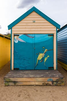 Colourful bathing boxes on the beach, in Brighton, Australia.