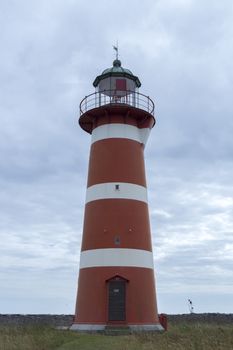 Red and White Lighthouse at Gotland, Sweden.