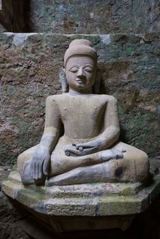 Buddha image at the Koe-thaung Temple, the temple of the 90,000 Buddhas, built by King Min Dikkha during the years 1554-1556 in Mrauk U, Rakhine State in Myanmar.