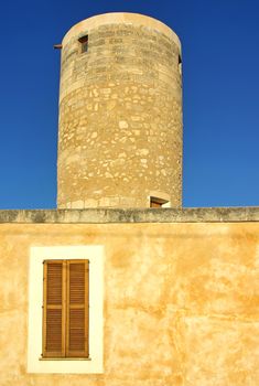 Old stone windmill in Manacor (Majorca - Spain)