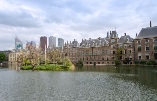 Dutch parliament buildings Binnenhof with skyscrapers in the background in The Hague, Netherlands,