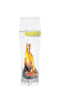Mineral water glass isolated with burning slice of lemon