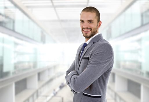 young happy businessman portrait at the office