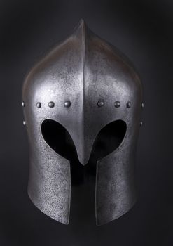 Iron helmet of the medieval knight. Very heavy headdress