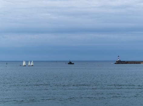 Sea bay in the city in cloudy weather