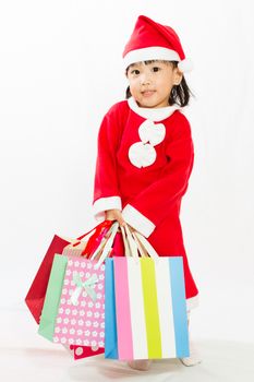 Asian Little Santa Claus with shopping bag in white isolated background