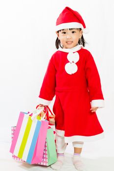 Asian Little Santa Claus with shopping bag in white isolated background