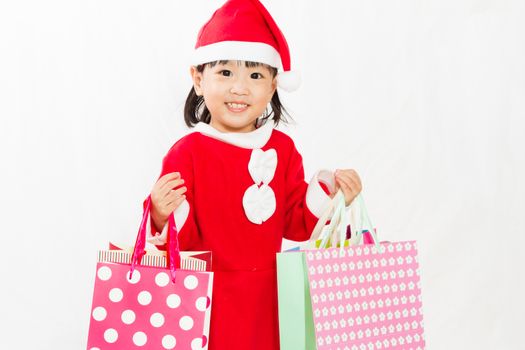 Asian Little Santa Claus with shopping bag in white isolated background