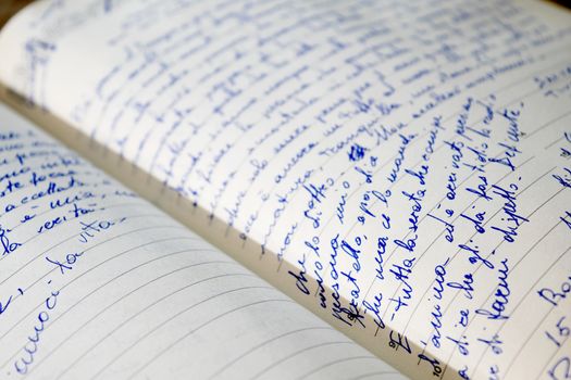 old handwritten diary with personal notes