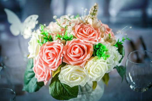 Just married bouquet on blurred gray background