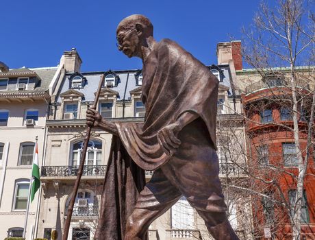 Mahatma Mohandas Gandhi Public Statue Front of Indian Embassy Embassy Row Massachusetts Ave Washington DC.  Gandhi is walking to sea on salt march.  Dedicated September 2000,  Artist Gautam Pal