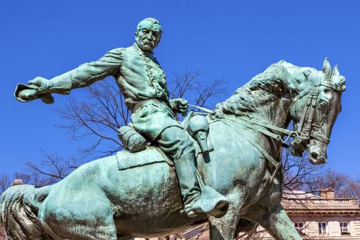 General Phil Sheridan Memorial Civil War Statue Sheridan Circle Embassy Row Pennsylvania Ave Washington DC.  Bronze statue dedicated in 1908; sculptor is Gutzon Borglum.  Public monument owned by the National Park Service. Statue depicts Sheridan riding his horse Rienzi to rally his troops at the Battle of Cedar Creek in 1864.