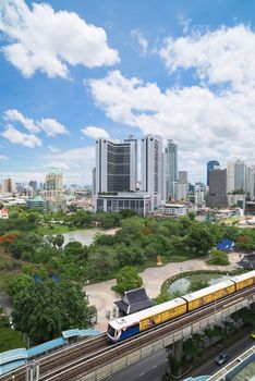 Bangkok, Thailand - May 22, 2015: With the BTS Skytrain, opened in 1999, Bangkok has developed fast in areas near the train stations, like here at Phrom Phong Station on the Sukhumvit line.