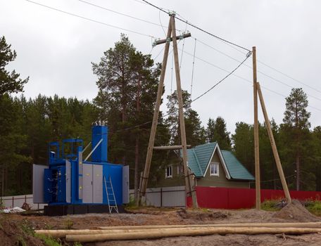 Construction of transformer substation and transmission line to supply electricity to homes