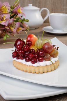 Dessert of sand tarts with whipped cream and fresh fruit