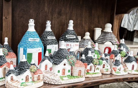 ALBEROBELLO, ITALY - SEPTEMBER 2, 2014: Typical souvenirs of Apulia. Alberobello is a famous tourist attraction in Italy.