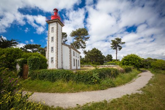 stone house and lighthouse at the mouth of the Odet