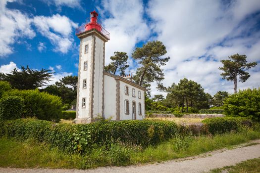 stone house and lighthouse at the mouth of the Odet