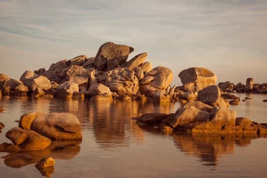 Trees and rocks at the beach of Palombaggia, the most famous beach of Corsica