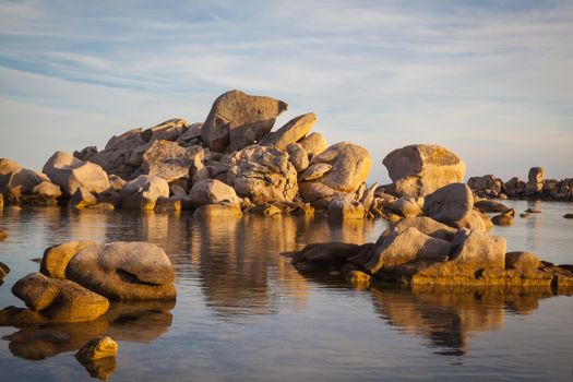 Trees and rocks at the beach of Palombaggia, the most famous beach of Corsica