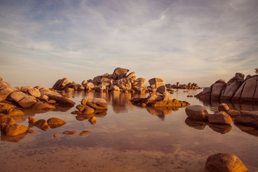 Trees and rocks at the beach of Palombaggia, the most famous beach of Corsica