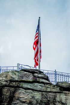 chimney rock and american flag