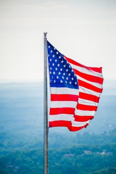 chimney rock and american flag