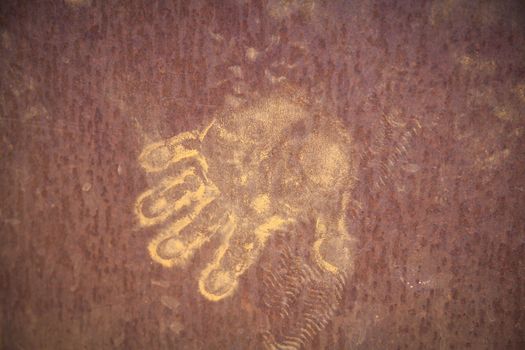 Handprints in ocher in Roussillion in Provence famous for the ocher quarries