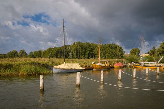 Old sailing boats in the port of Ahrenshoop in Darß on the Baltic Sea