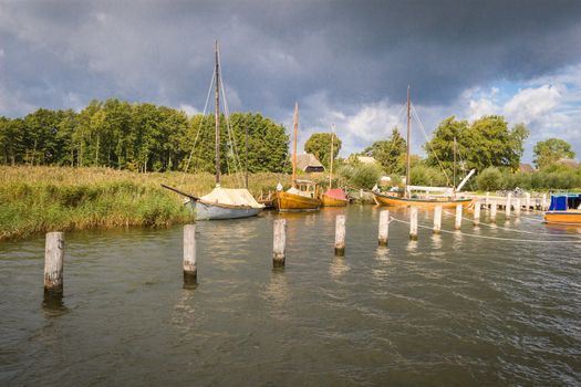 Old sailing boats in the port of Ahrenshoop in Darß on the Baltic Sea