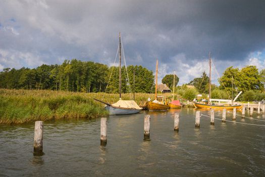 Old sailing boats in the port of Ahrenshoop in Darß on the Baltic Sea