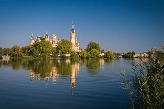 Schwerin Castle (Schweriner Schloss) reflected in the lake