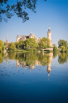 Schwerin Castle (Schweriner Schloss) reflected in the lake