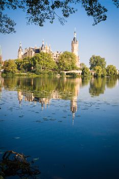 Schwerin Castle (Schweriner Schloss) reflected in the lake