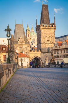 The western tower of the Charles Bridge with view to Prague Castle