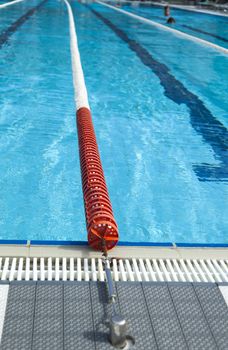 The swimming pool under beams of the sun is ready to competitions and rest