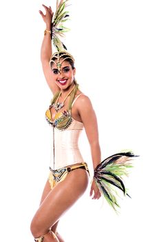 Beautiful woman posing in carnival costume over white