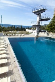 The swimming pool under beams of the sun is ready to competitions and rest