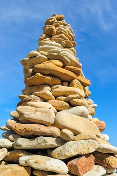 Stones laid out in the form of a pyramid on the coast