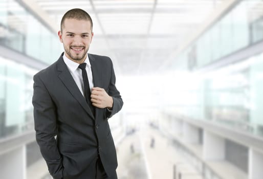 happy young businessman portrait at the office