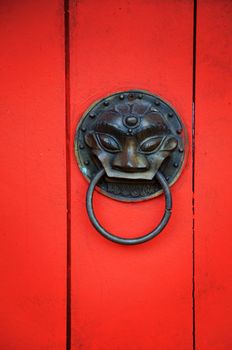 Detail shot of a door in a traditional chinese temple.