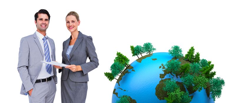 Business people looking at camera against earth with forest